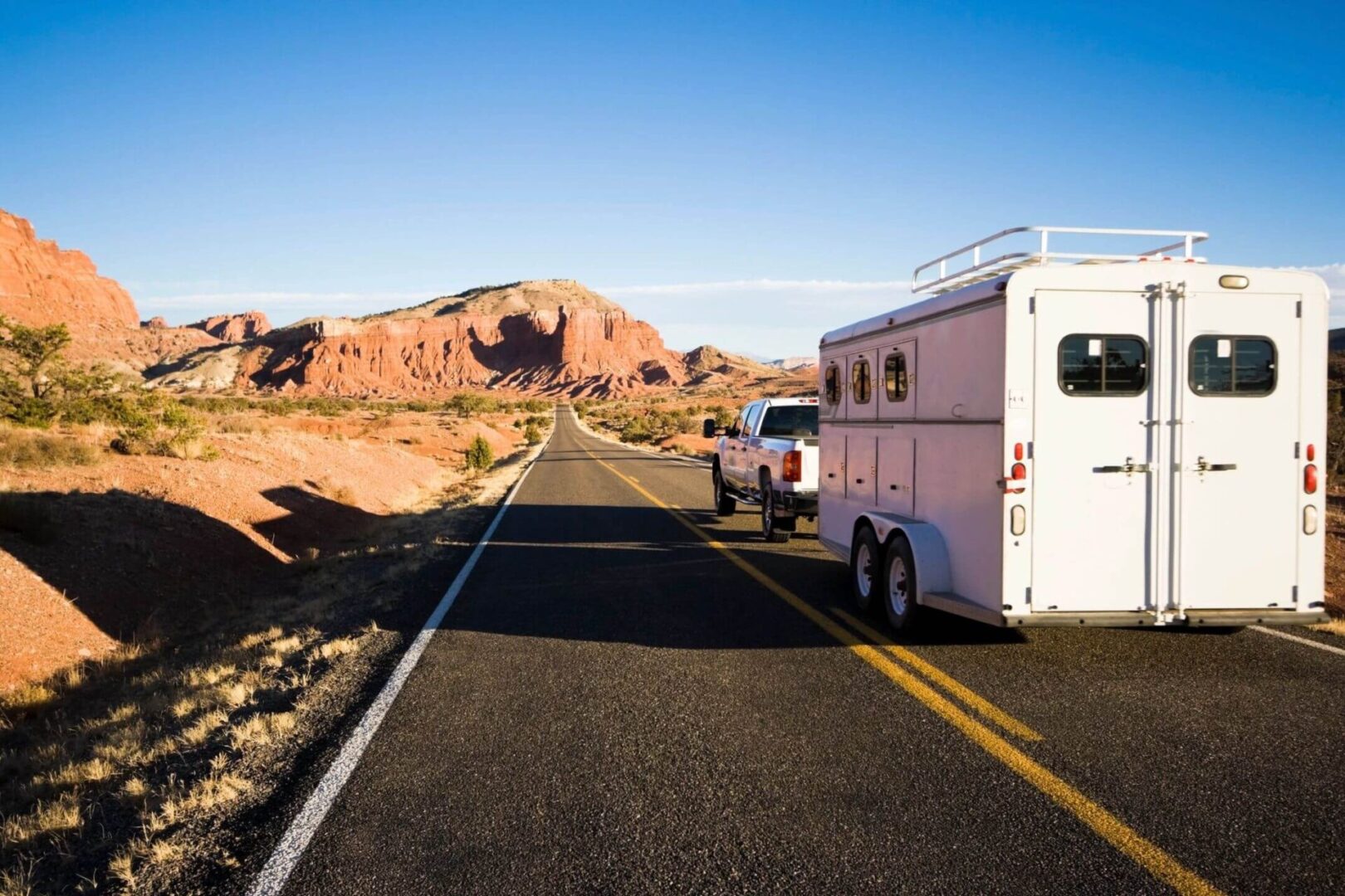 Mobile Home on the Road in a Barren Landscape